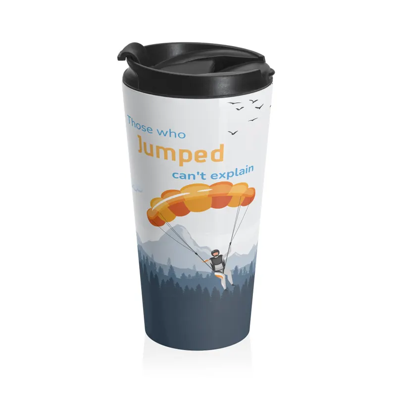 Skydiving travel mug made of stainless steel, featuring an inspirational quote and a parachutist over mountains, making it a practical and symbolic gift for skydivers.